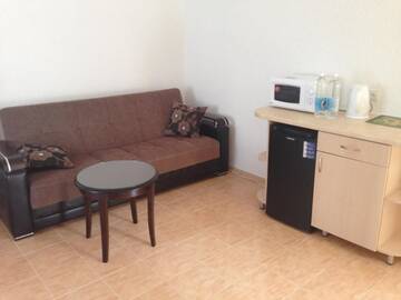 Фото номера Большой двухместный номер с 1 кроватью Гостиница Apartment Komsomolskaya г. Евпатория 10