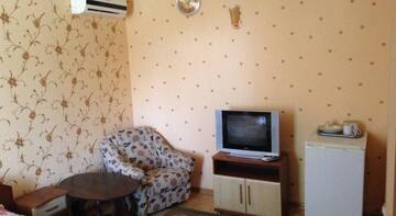 Фото номера Двухместный номер с 2 отдельными кроватями Гостиница Татьяна г. Евпатория 4