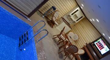 Фото номера Апартаменты с видом на бассейн Гостиница Guest House Liliya г. Евпатория 16