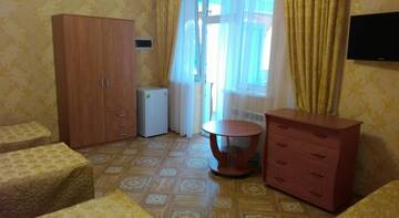 Фото номера Четырехместный номер Гостиница Якорь г. Евпатория 22