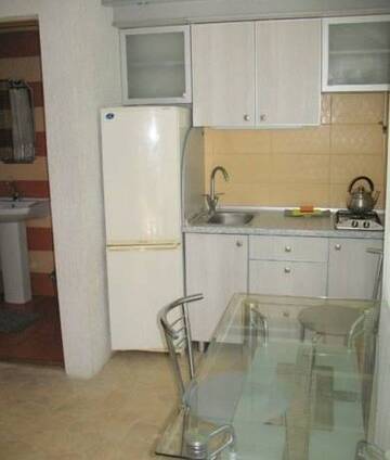 Фото номера Четырехместный номер с террасой Гостиница Guest House na Revolutsii г. Евпатория 9
