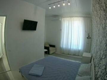 Фото номера Улучшенный семейный номер Гостиница Guest House na Revolutsii г. Евпатория 5