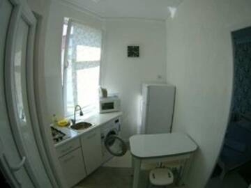 Фото номера Улучшенный семейный номер Гостиница Guest House na Revolutsii г. Евпатория 7