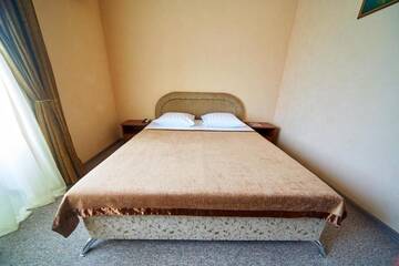 Фото номера Стандартный двухместный номер с 1 кроватью или 2 отдельными кроватями Гостиница Юлиана г. Евпатория 2