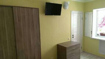 Фото номера Трехместный номер с общим туалетом Гостиница Guest House Iris г. Евпатория 10