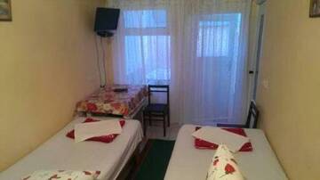 Фото номера Трехместный номер с основными удобствами Гостиница Guest House Iris г. Евпатория 13