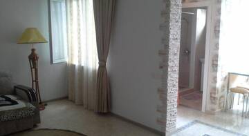 Фото номера Номер-студио с диваном-кроватью Гостевой дом Kirova Holiday Homes г. Евпатория 8