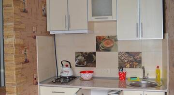 Фото номера Семейный номер с душем Гостевой дом Kirova Holiday Homes г. Евпатория 6